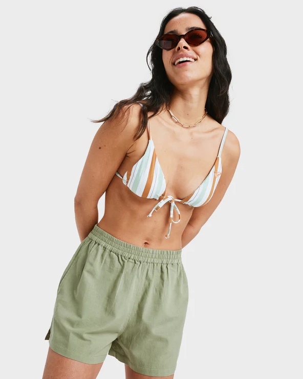 Roxy Lekeitio Bay II Womens Walkshorts in oil green on model in bikini top from front close up