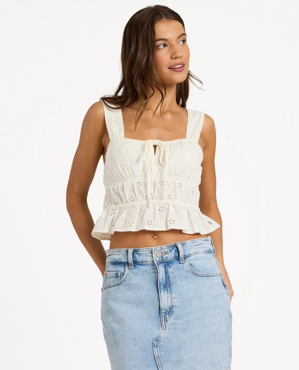 Roxy Lucky One Sunset Mist Tank Top in white on model in denim skirt from the front close up