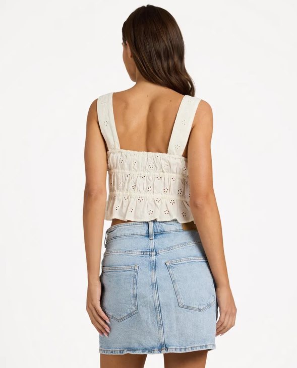 Roxy Lucky One Sunset Mist Tank Top in white on model in denim skirt from rear