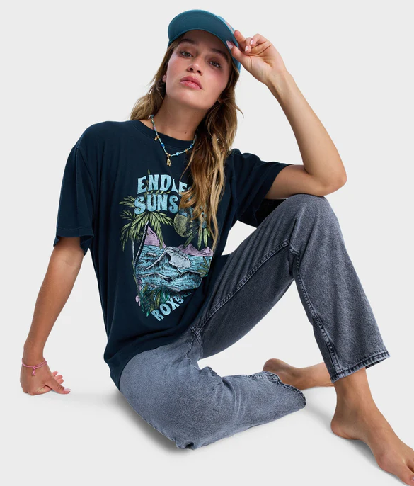 Roxy Sunny Oversize Stone Wash Womens Tee in anthracite on model in jeans from front sitting down