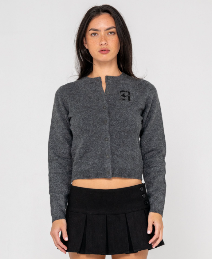 Rusty Academy Women's Cardigan in charcoal marle on model in black skirt from front close up