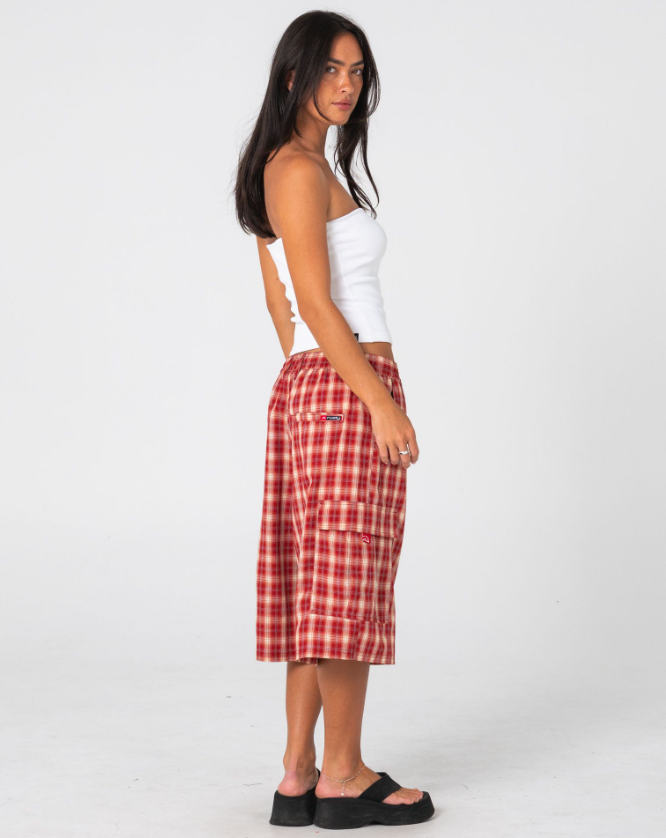 Rusty Art Attack Boob Tube in white on model in red checked shorts from right side