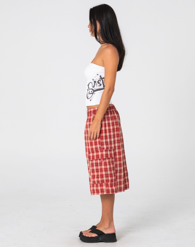 Rusty Art Attack Boob Tube in white on model in red checked shorts from the side