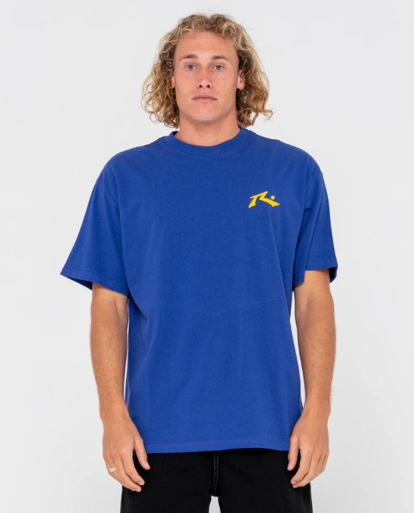 Rusty Competition Tee in royal blue with yellow r dot from front