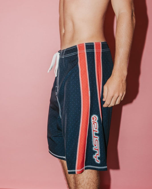 Rusty Cybernate 23" Boardshorts in black with red stripes from side