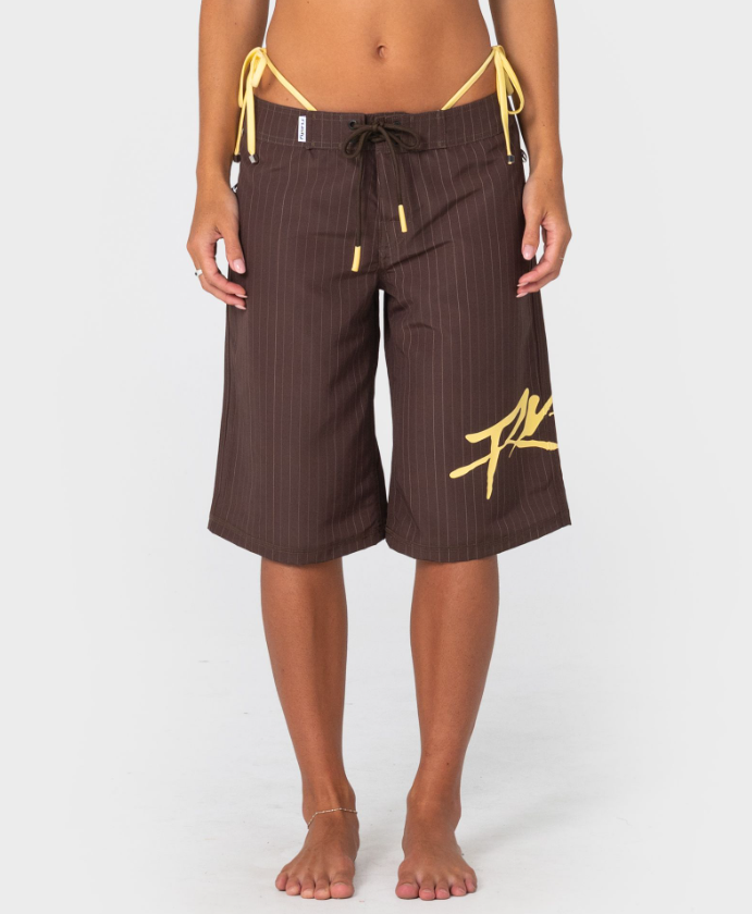 Rusty Cyberpunk Fixed Waist 22" Women's Boardshorts in java with yellow colourway on model from the front close up