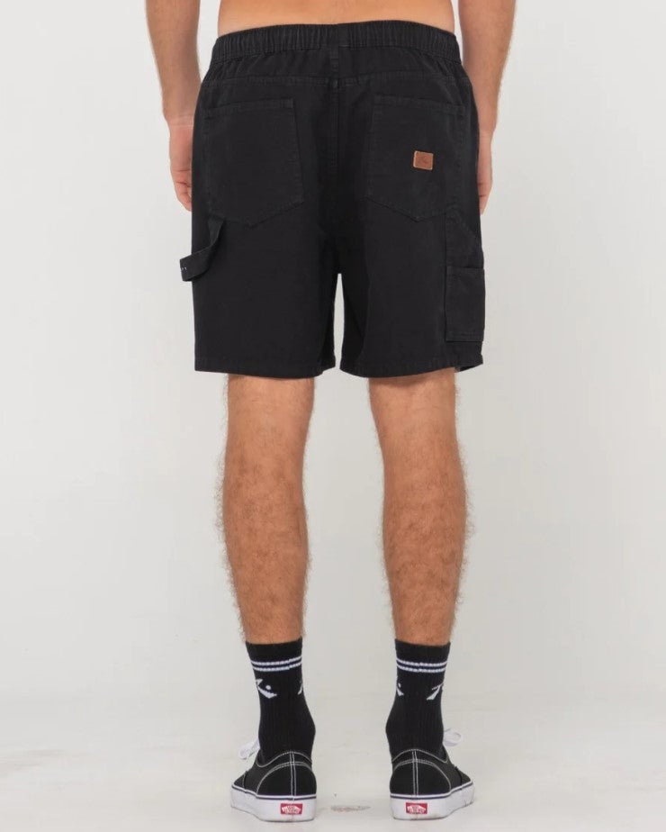 Rusty Dungaree Elastic Waist Shorts in black from rear