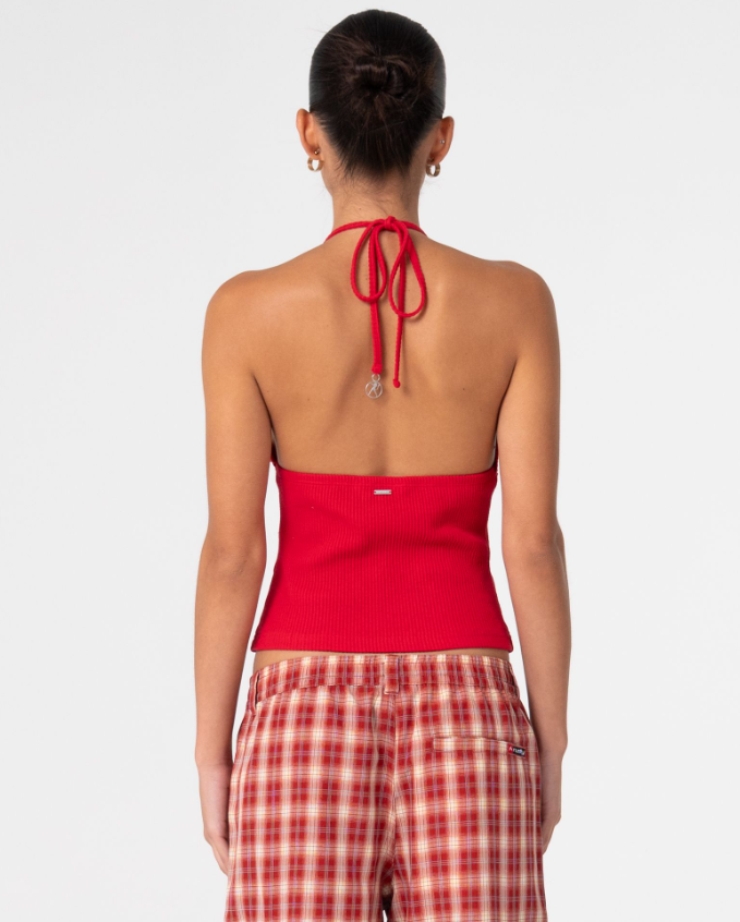 Rusty Emma Cut Out Skimmer Tank in red on model from the back in red checked long shorts 