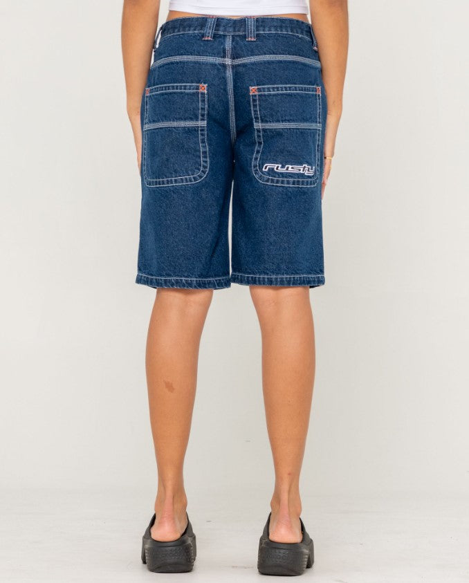 Rusty Flip Mommy Low Rise Wide Leg Denim Jort in deep sea blue with orange band from rear