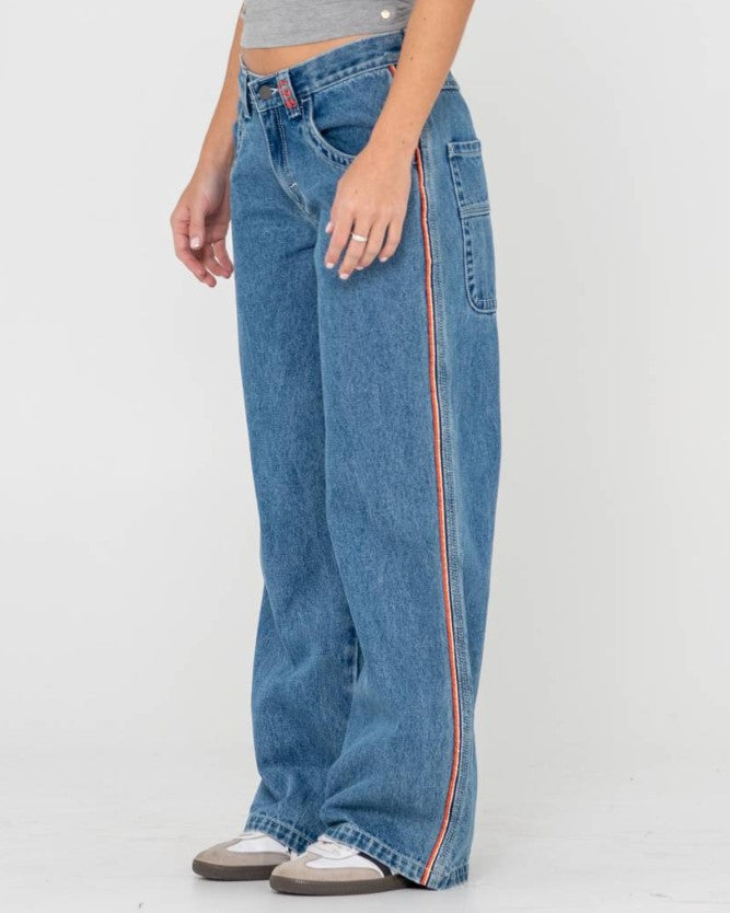 Rusty Flip Mommy Low Rise Wide Denim Jeans in middy blue with orange from side