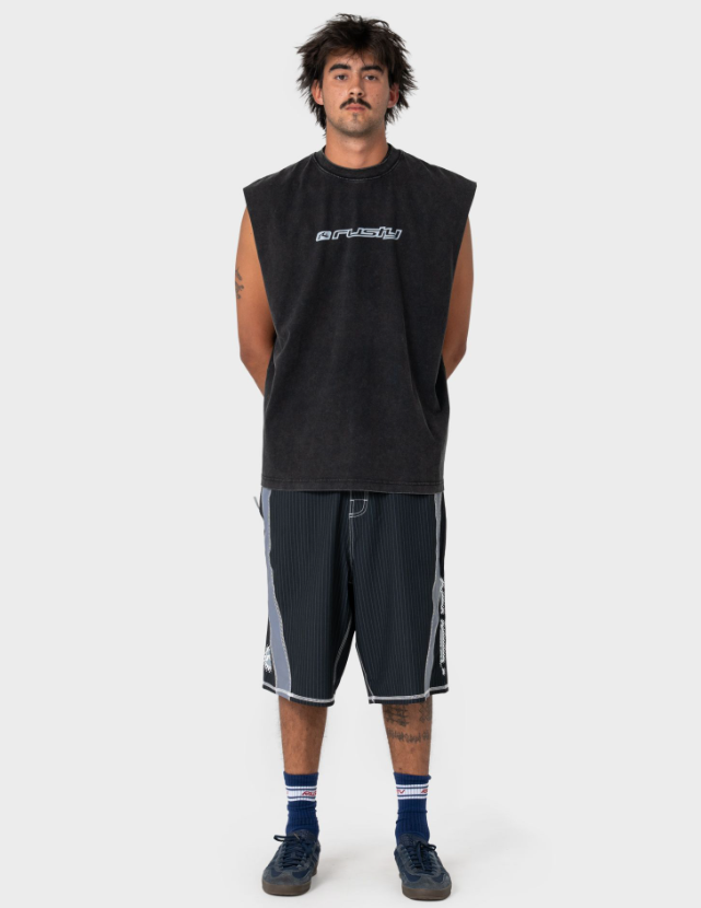 Rusty Fragment Muscle Top in black on model in black Rusty boardshorts on white background