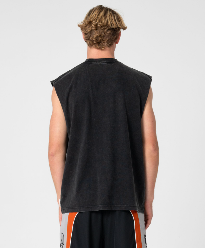 Rusty Fragment Muscle Top in black on model from rear view