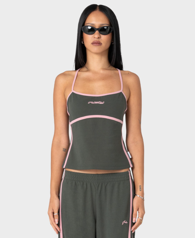 Rusty Freo King Fitted Top in savannah colourway with pink trim on model in Rusty track pants from the front close up