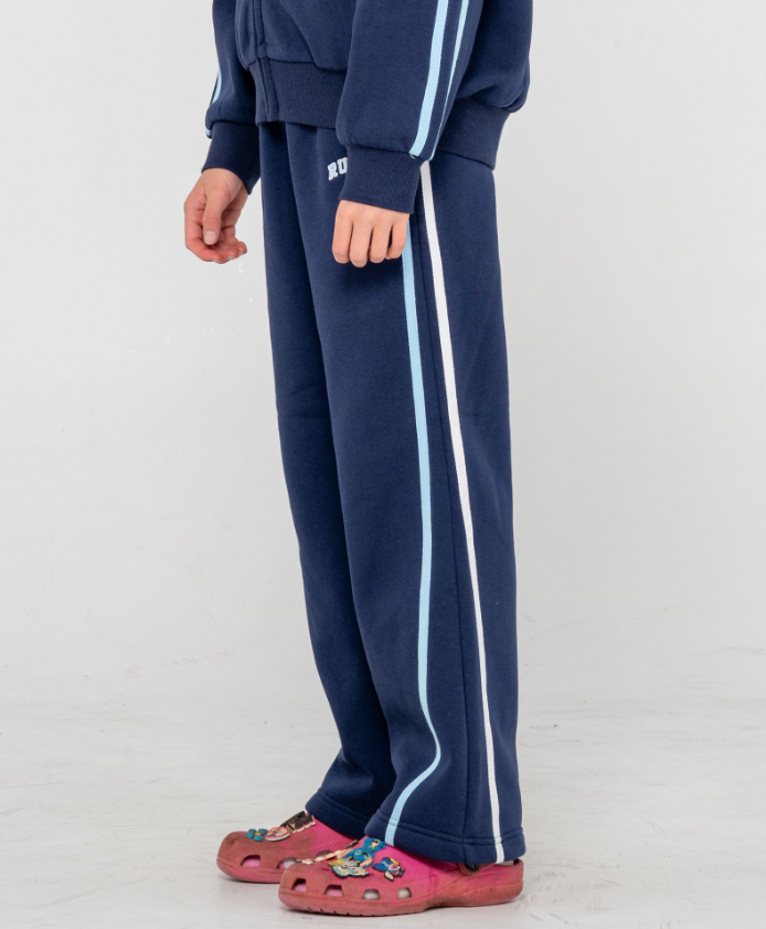 Rusty Girls Team Varsity Wide Leg Jogger Pants in navy with blue and white stripes from side