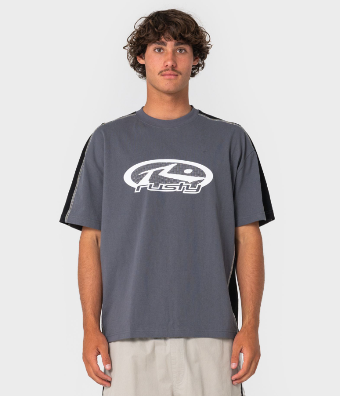 Rusty Hit Up Men's T-Shirt in steel colourway on model in cargo shorts from the front close up