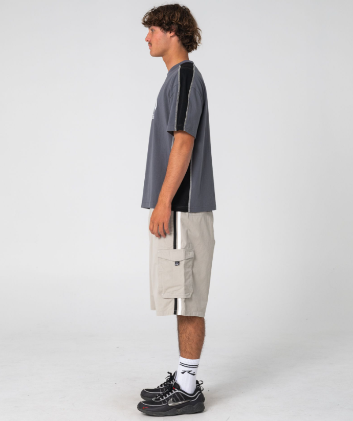 Rusty Hit Up Men's T-Shirt in steel colourway on model in cargo shorts from the side