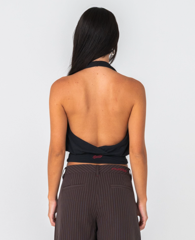 Rusty Honey Halter Top in back on model in brown pinstripe shorts from the back close up