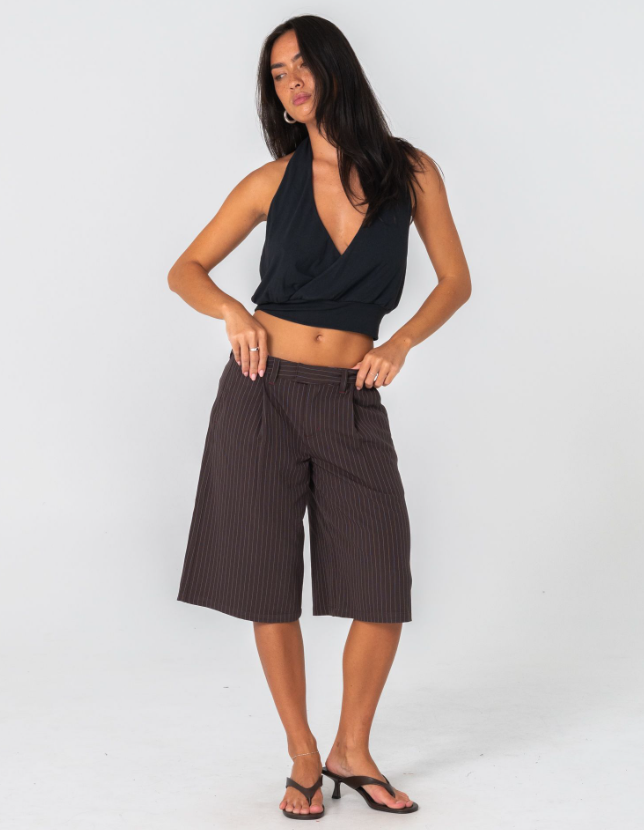 Rusty Honey Halter Top in back on model in brown pinstripe shorts from the front