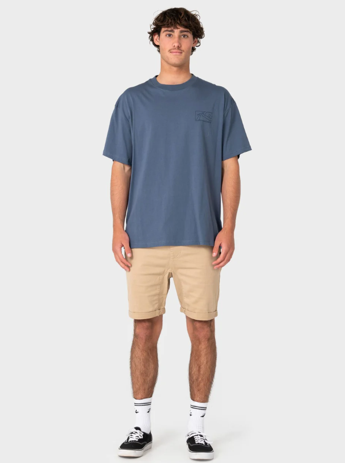 Rusty Hooked On 18" Elastic Walkshorts
 in khaki on model in blue tee from the front