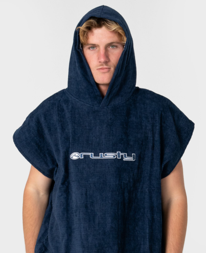 RUSTY JUST SURFING CHANGE TOWEL
 in navy colourway on model from the front close up