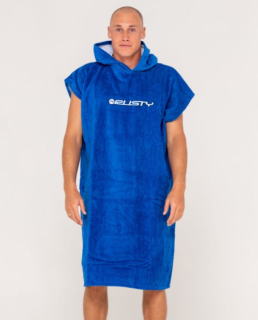 Rusty Just Surfing Hooded Change Towel in royal blue on model from front with embroidered Rusty logo