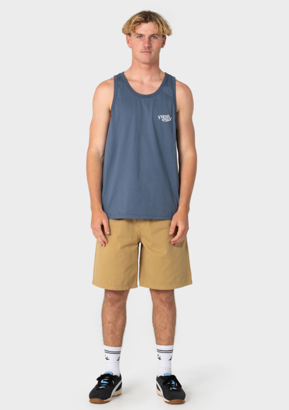 Rusty Rumble Elastic Waist 21" Men's Walkshorts in khaki on model in blue Rusty singlet from front