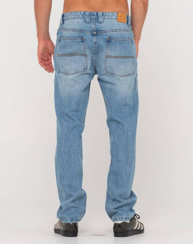 Rusty Seven Straight Jeans in hard hat blue from back