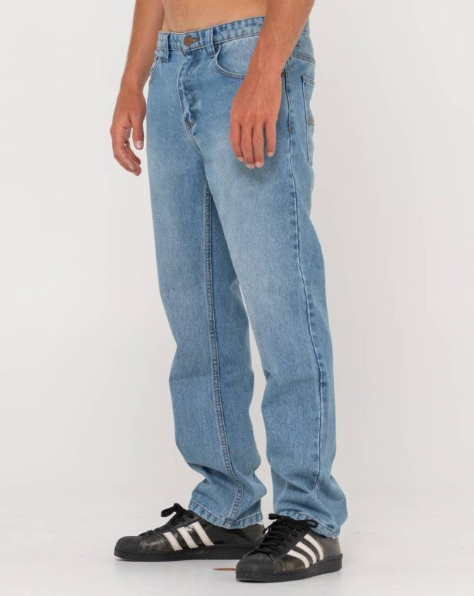 Rusty Seven Straight Jeans in hard hat blue from side