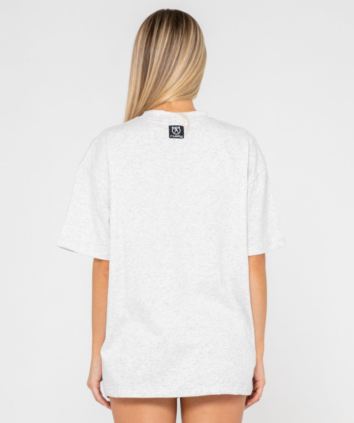 Rusty Sprayer Oversize Women's Tee in ecru marle colour on model from rear