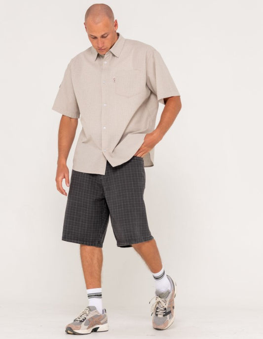 Rusty Stasha Pocket Short Sleeve Men's Shirt  in light khaki on model in checked shorts