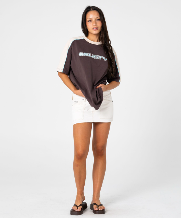 Rusty Timmy Target 220 Oversized Women's Tee in java with cream detail on model from the front on a model full length