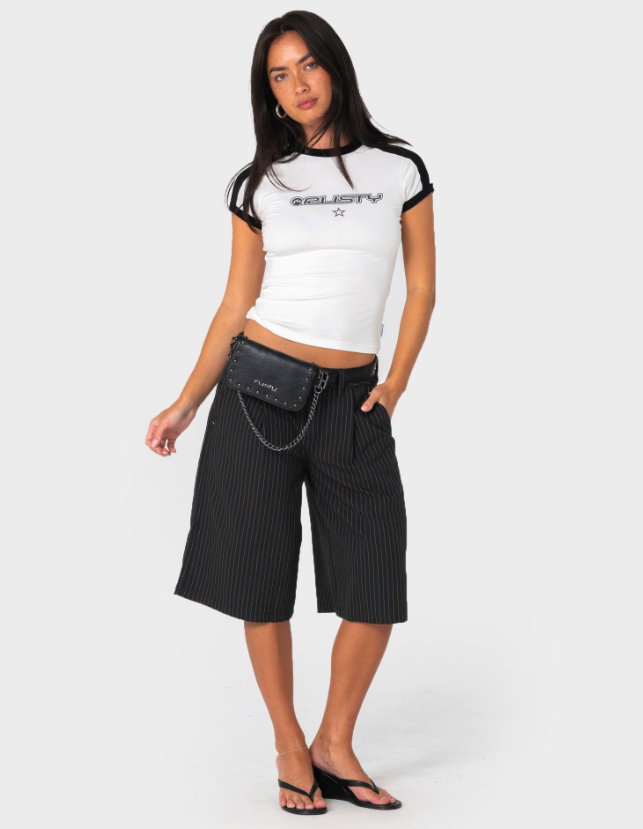 Rusty Wild Saint Belt Bag in black on models belt