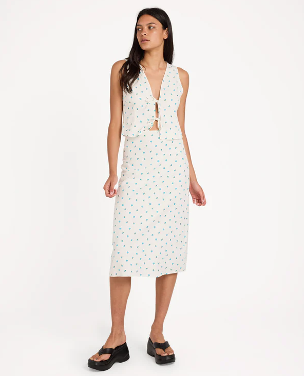 RVCA Rose Bud Annika Midi Skirt in white with floral print on model from front