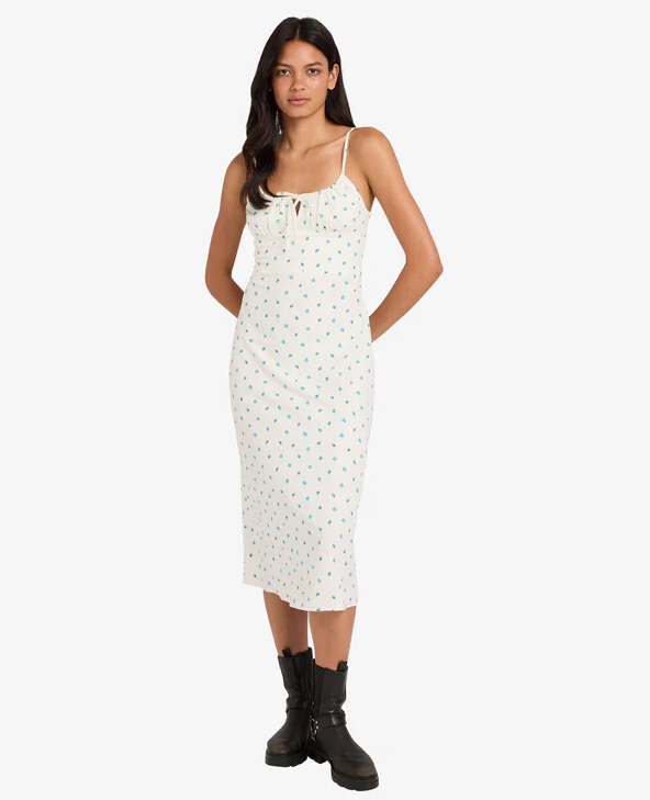 RVCA Rose Bud Cafe Dress in white with floral detail on model from front 