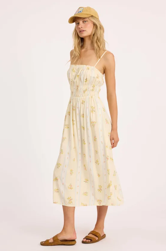 Sisstrevolution Daydreamer Woven Dress in sunshell colourway on model from the side