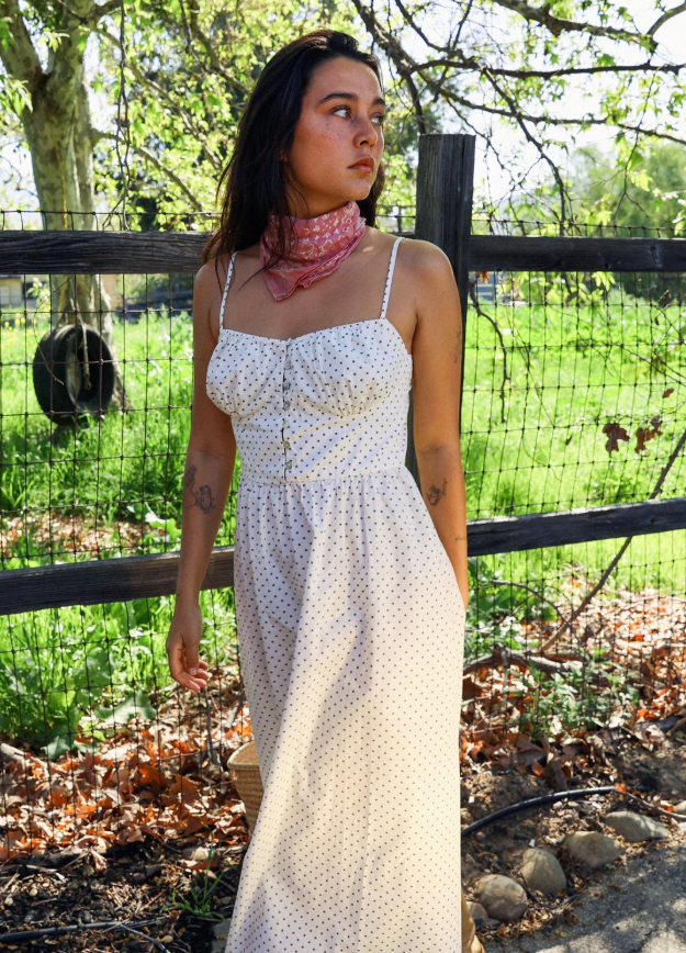 Sisstrevolution Dot Your Eyes Woven Dress in sea salt colourway on model in outdoors from front/side view