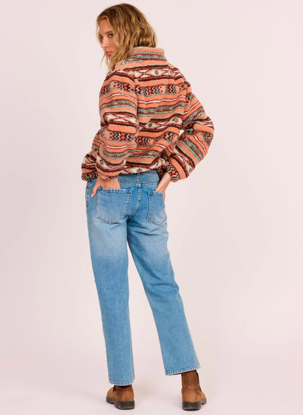 Sisstrevolution Smooth Women's Sherpa Fleece in canyon rose colourway on model from rear