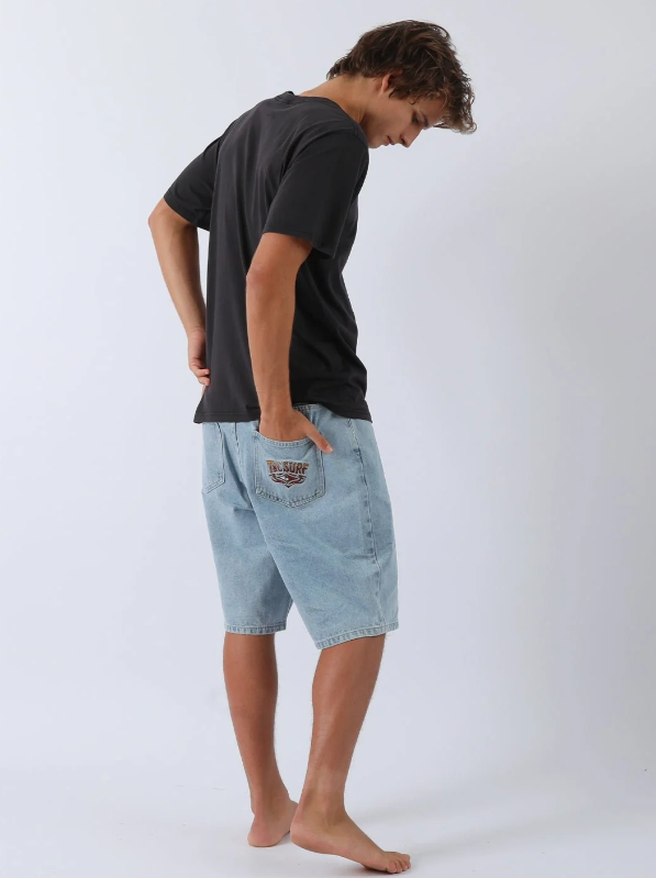 T & C Thrift Boys Denim Shorts in washed blue on model from the rear