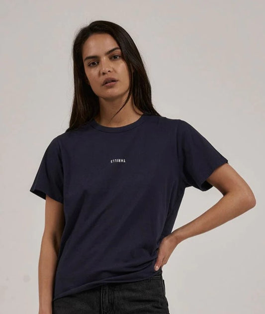 Dak haired model wearing the Thrills Women's Relaxed Tee in navy from front