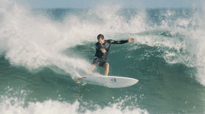 Thunderbolt Red 6'6 Harley Ingleby HIBT 3+3 Surfboard being surfboard by Harley in assym set up