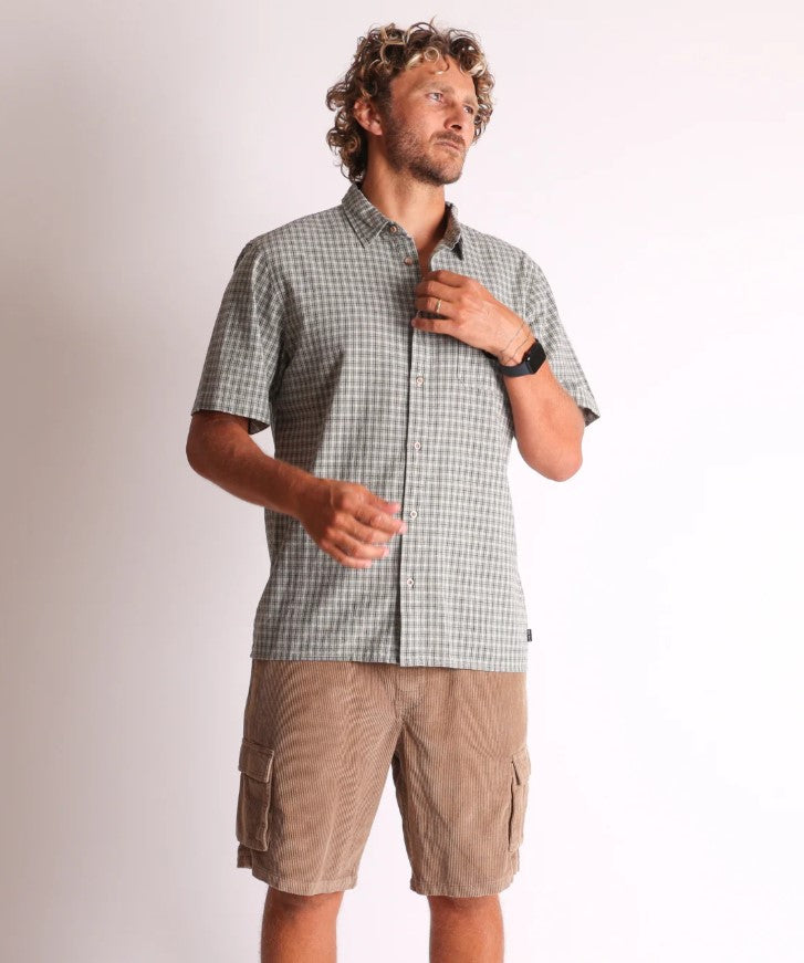Town and Country Barrack Cord Shorts in sand colourway on model wearing check shirt from front view