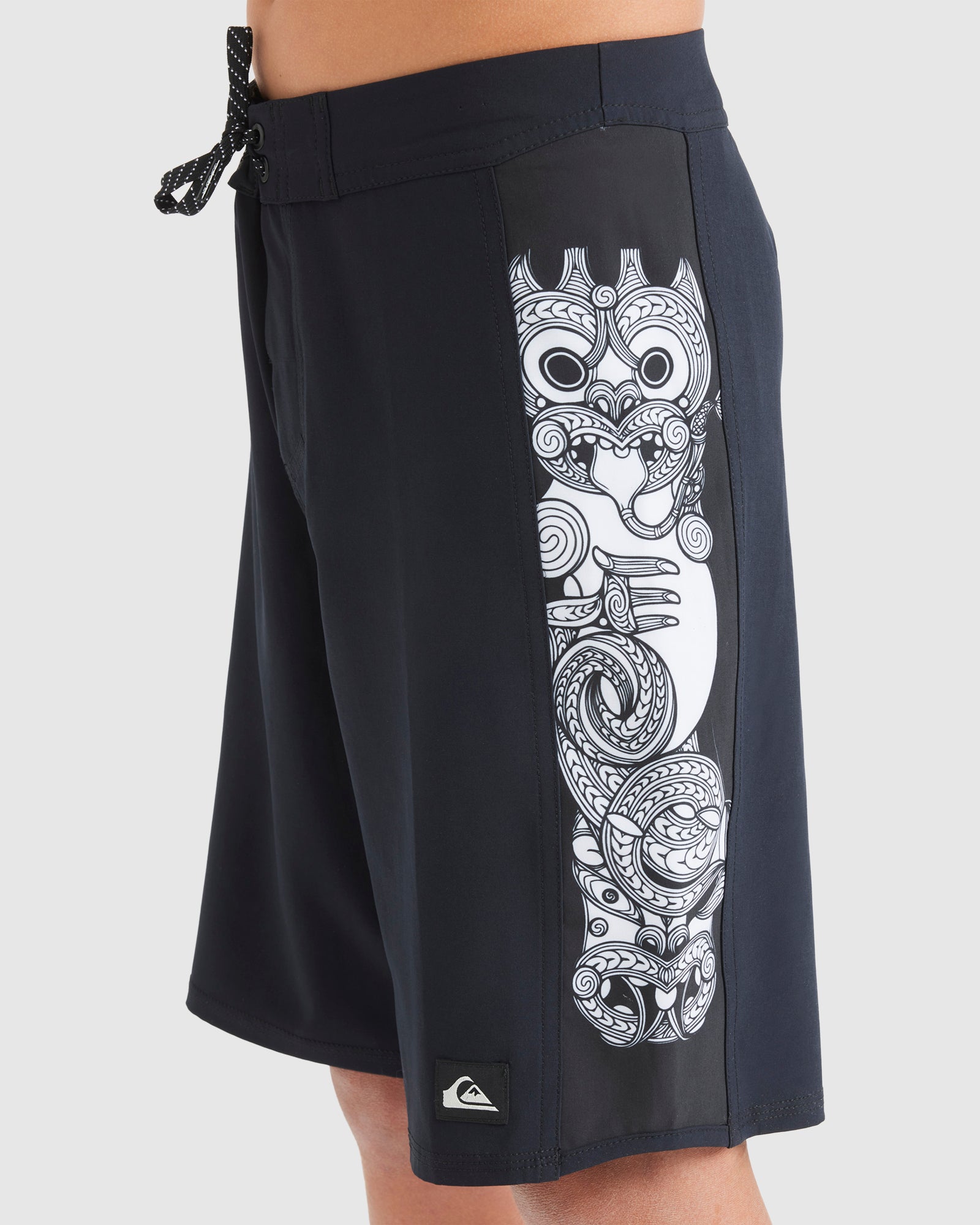 Quiksilver Surfsilk Marakihau Arch Youth Boardshorts  in black from side showing taniwha marakihau panel