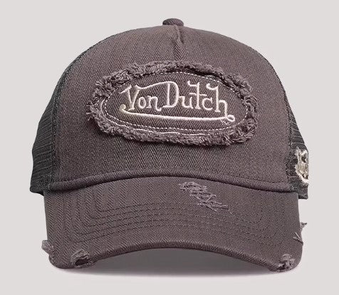 Von Dutch Unisex Trucker Cap in dark taupe colourway on gray background
